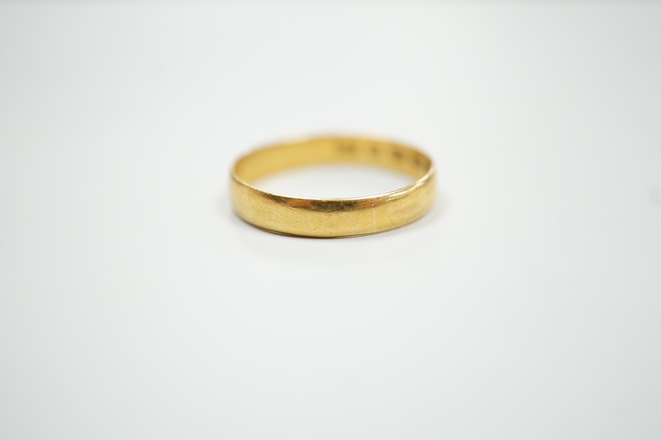 A Victorian 22ct gold wedding band, Birmingham, 1861, size P, 2.3 grams.